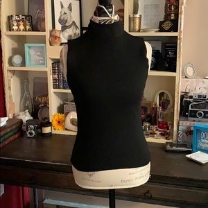 Sleeveless Ribbed Turtleneck